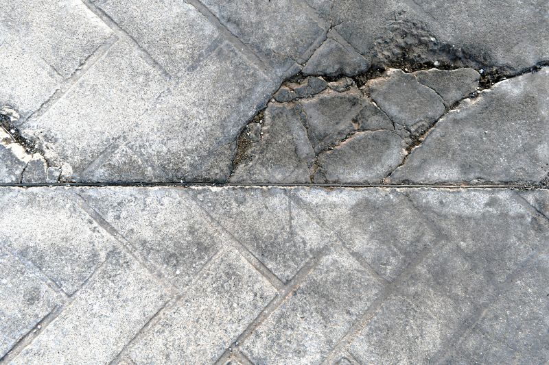 Before Repair: Cracked Driveway